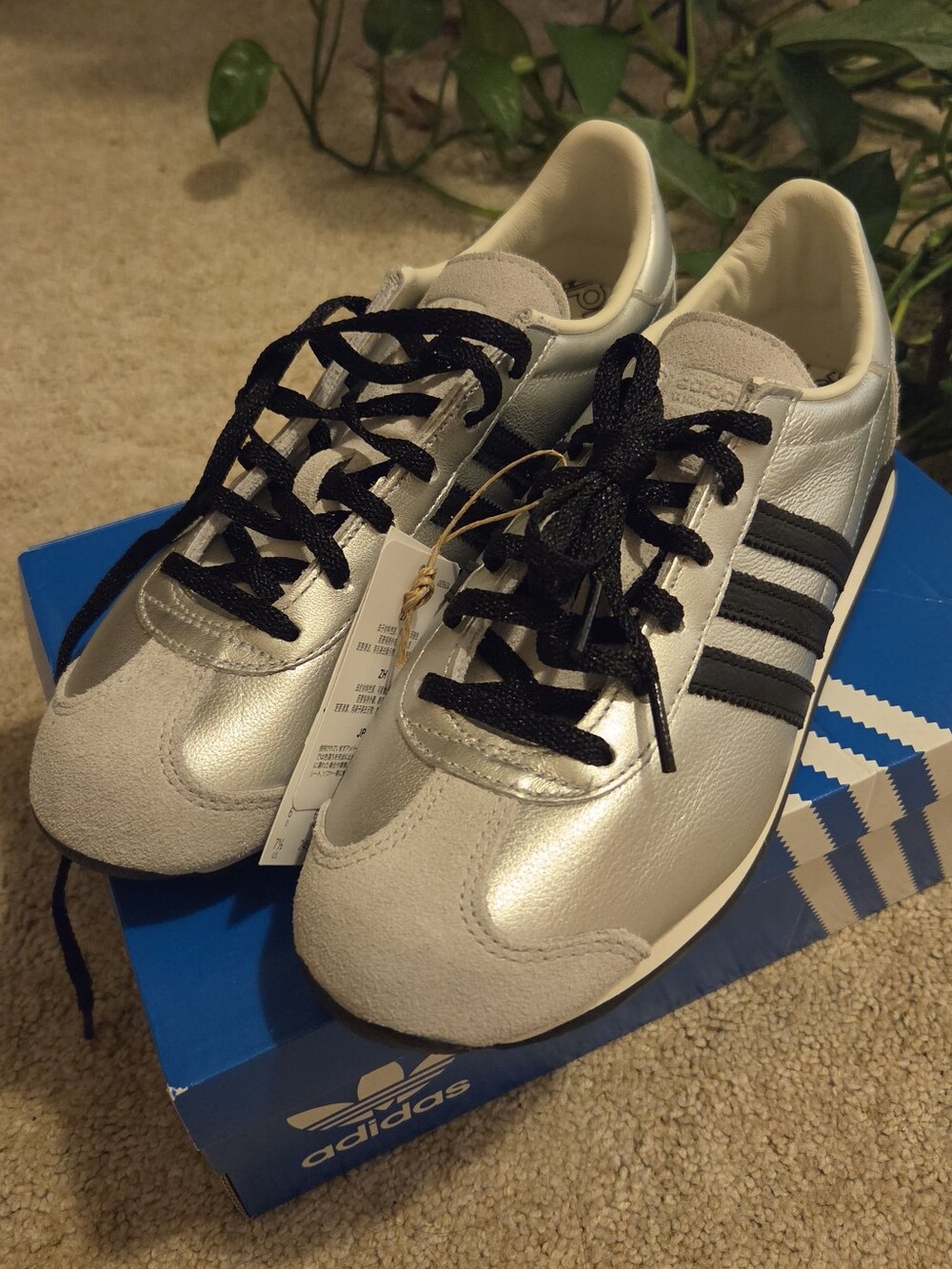 adidas Women’s Metallic Silver Sneakers with Black Stripes